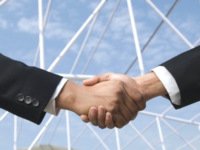 Close-up of two businessmen shaking hands